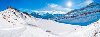 Winter holidays chalet skier 