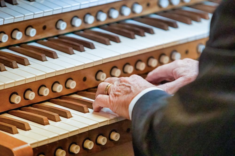 Men Playing Church Organ